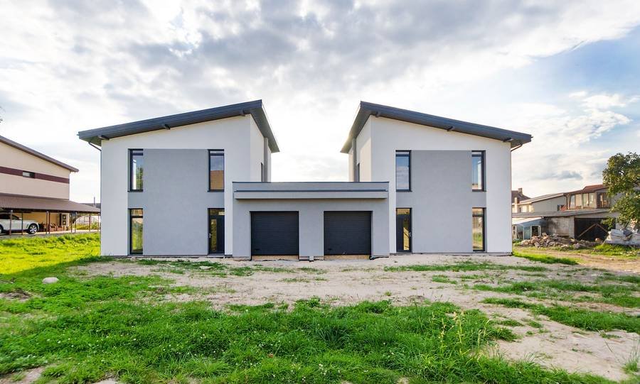 A modern duplex with two matching units