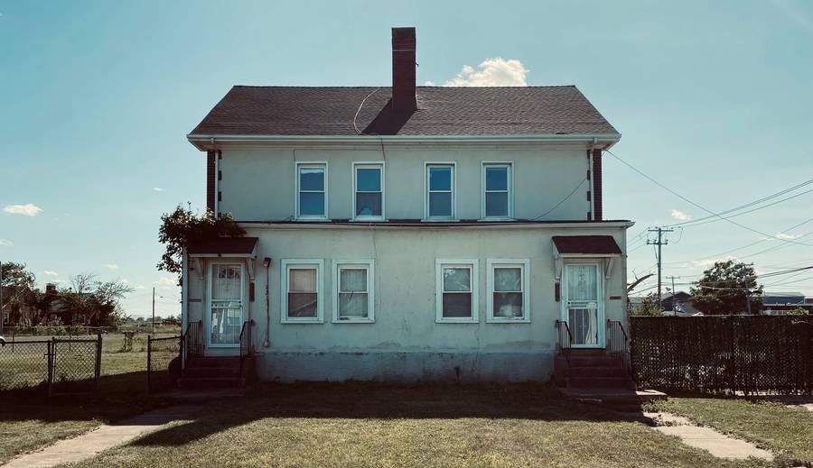 A two-story house with two entrances